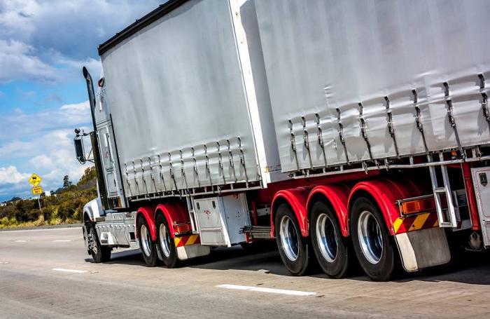How do trucking challenges affect the animal feed industry?
